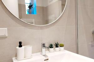 Baðherbergi á Homelystay Graz - downtown app