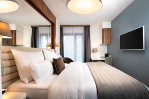 TV a/nebo společenská místnost v ubytování Leonardo Boutique Hotel Krakow City Center