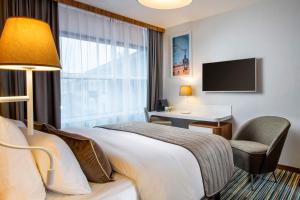 TV a/nebo společenská místnost v ubytování Leonardo Boutique Hotel Krakow City Center