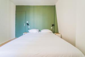 Posteľ alebo postele v izbe v ubytovaní Logis Cosy sur la Guierle - 1 Chambre
