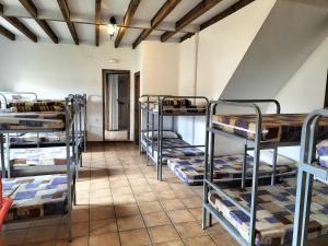 Postel nebo postele na pokoji v ubytování Albergue Don Camino