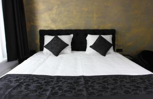 Postel nebo postele na pokoji v ubytování Sara's Boutique Hotel