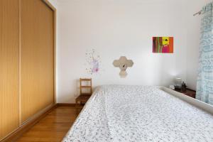 Postel nebo postele na pokoji v ubytování Apartamento perto Serra de Sintra