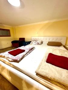 Posteľ alebo postele v izbe v ubytovaní Kaldi Rooms