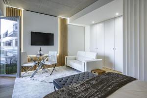 A television and/or entertainment centre at Apartamento Vista Mar