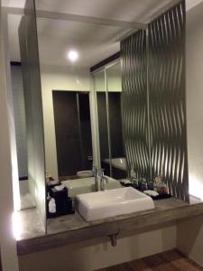 Ett badrum på Win D Hotel