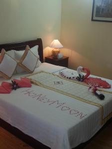 Postel nebo postele na pokoji v ubytování TIEN DAT MUI NE Resort & Spa