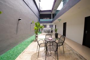 Un patio sau altă zonă în aer liber la Hotel Mezzo