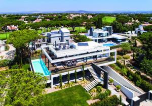 an aerial view of a villa with a swimming pool at Vale do Lobo Sky Villa by Homing in Vale do Lobo