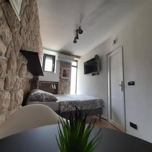 Postel nebo postele na pokoji v ubytování Apartmani Audacia Crikvenica