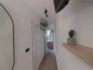 TV a/nebo společenská místnost v ubytování Apartmani Audacia Crikvenica