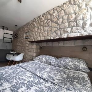 Postel nebo postele na pokoji v ubytování Apartmani Audacia Crikvenica