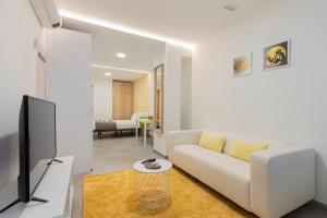 Telewizja i/lub zestaw kina domowego w obiekcie Dobo Madrid ANR1