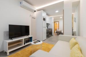 Telewizja i/lub zestaw kina domowego w obiekcie Dobo Madrid ANR1