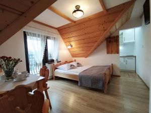 Posteľ alebo postele v izbe v ubytovaní Willa Toporek + 22 fotografií