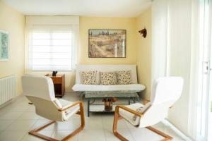 Posezení v ubytování Les Pites I 2n 2a Bonito apartamento con terraza