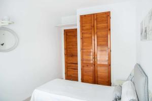 Postel nebo postele na pokoji v ubytování Les Pites I 2n 2a Bonito apartamento con terraza