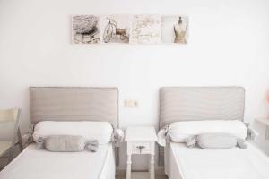 Postel nebo postele na pokoji v ubytování Les Pites I 2n 2a Bonito apartamento con terraza