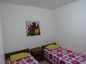 Postel nebo postele na pokoji v ubytování Espectacular y cómodo Apartamento en Girardot WiFi + 27 fotografií