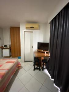 TV a/nebo společenská místnost v ubytování Locação Caldas Novas 1105