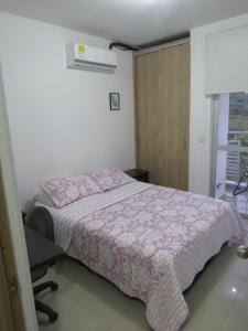 Postel nebo postele na pokoji v ubytování Espectacular y cómodo Apartamento en Girardot WiFi