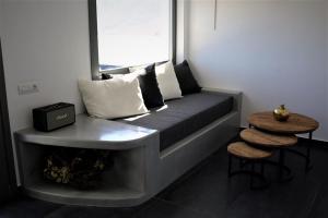 A seating area at A Lux Villas Santorini