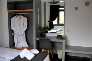 A bed or beds in a room at A Lux Villas Santorini