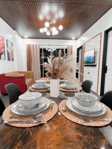 TV a/nebo společenská místnost v ubytování Das Haus + 21 fotografií