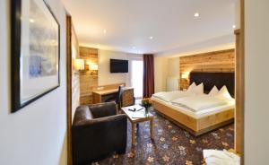 Postel nebo postele na pokoji v ubytování Hotel Randsbergerhof