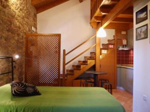 Postel nebo postele na pokoji v ubytování Taverna Lusitana