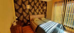 Posteľ alebo postele v izbe v ubytovaní Angel City Apartments