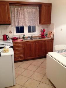 A kitchen or kitchenette at Nice Apartment 3 - City Center