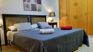 A bed or beds in a room at La Pausa