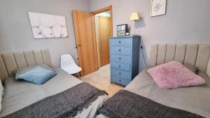 A bed or beds in a room at La Pausa