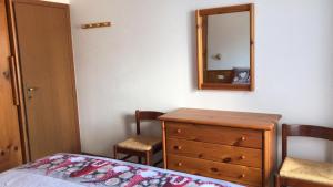 Postel nebo postele na pokoji v ubytování Casa Gnomi