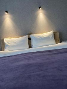 Postel nebo postele na pokoji v ubytování Harmony Resort