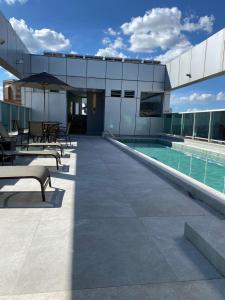A piscina localizada em San Diego Suítes Lourdes - OFICIAL ou nos arredores
