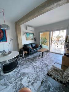 Posezení v ubytování Apartamento centro de Dénia 1ra linea, vistas puerto y mar