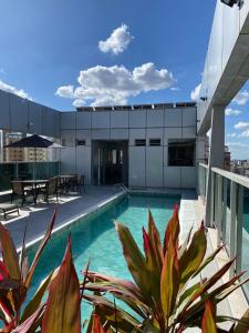 A piscina localizada em San Diego Suítes Lourdes - OFICIAL ou nos arredores
