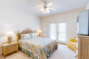 En eller flere senge i et værelse på Dunes East