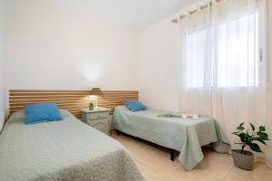 A bed or beds in a room at Mare Internum