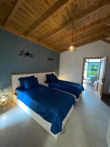 מיטה או מיטות בחדר ב-Manolya villa
