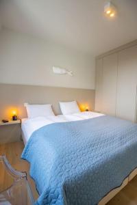 Ένα ή περισσότερα κρεβάτια σε δωμάτιο στο Georgie Light, lofty luxurious