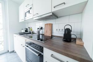 Kuchyň nebo kuchyňský kout v ubytování Full House Apartments - HS46 3 Bedroom Apartment