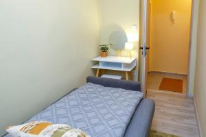 Posteľ alebo postele v izbe v ubytovaní Parti Sétány Apartman