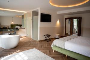 Postel nebo postele na pokoji v ubytování Hotel Boutique Las Indianas