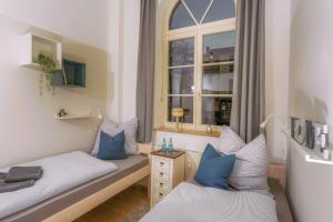 Postel nebo postele na pokoji v ubytování Apartment Westend
