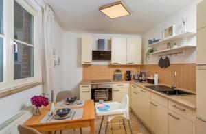 Kuchyň nebo kuchyňský kout v ubytování Apartment Westend