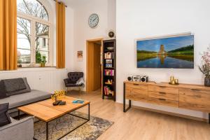 TV a/nebo společenská místnost v ubytování Apartment Westend