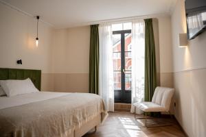 Postel nebo postele na pokoji v ubytování Hotel Boutique Las Indianas